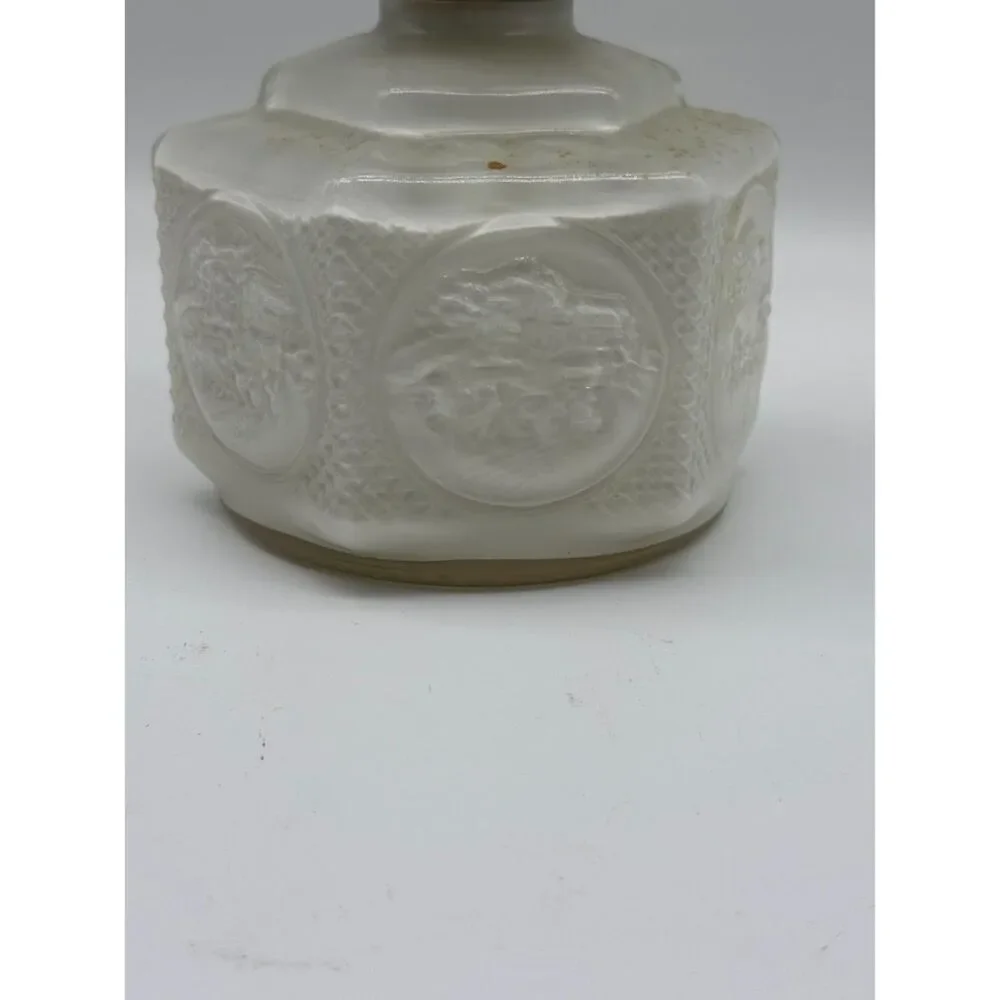 vintage oil lamp featuring a hexagonal base embossed  a horse and buggy scene